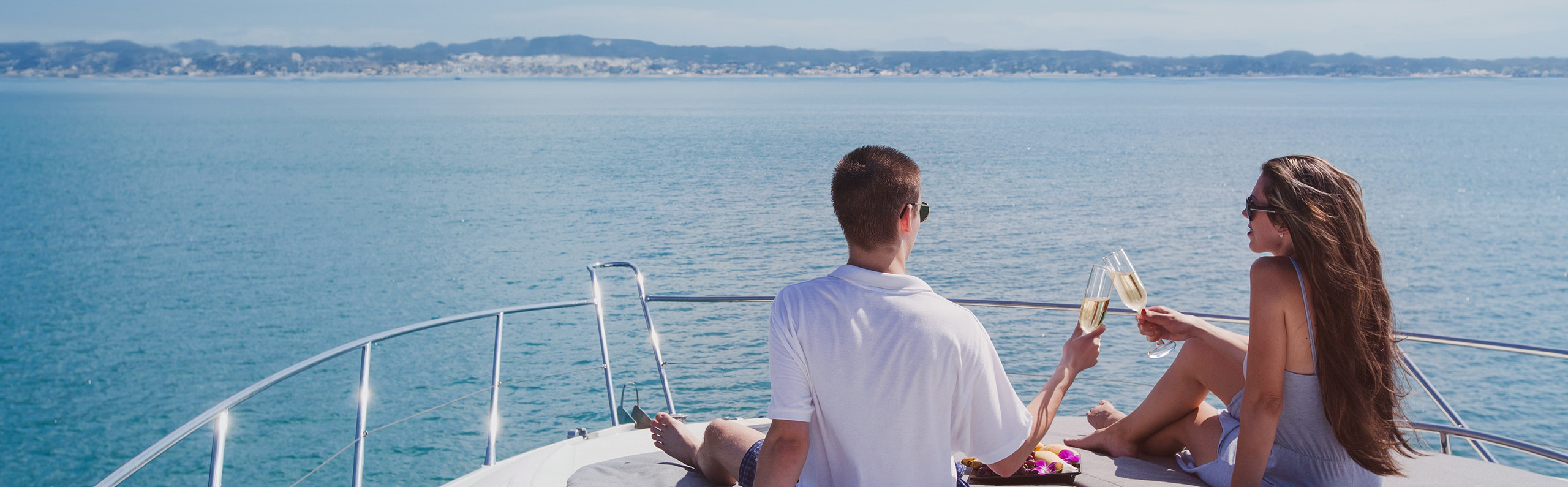 boat champagne-shutterstock_2446093961-crop2